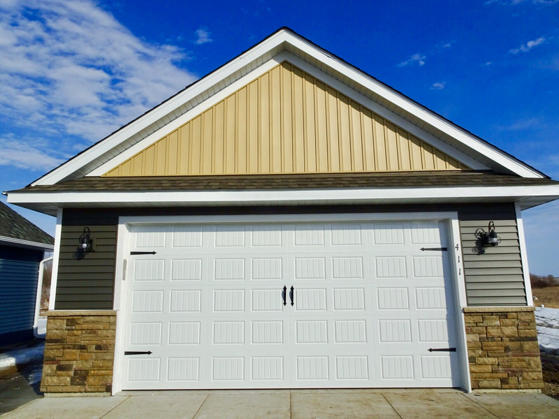 Amarr Hillcrest 3000 Garage Door in White with Short Bead Board Panels.  Installed by Augusta Garage Door in Annandale, MN.