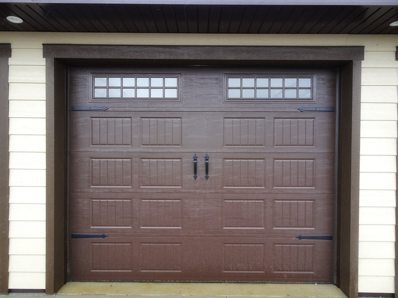 Amarr Designer's Choice Garage Door in Brown with Short Bead Board Panels and Stockton Windows.  Installed by Augusta Garage Door in Cokato, MN.