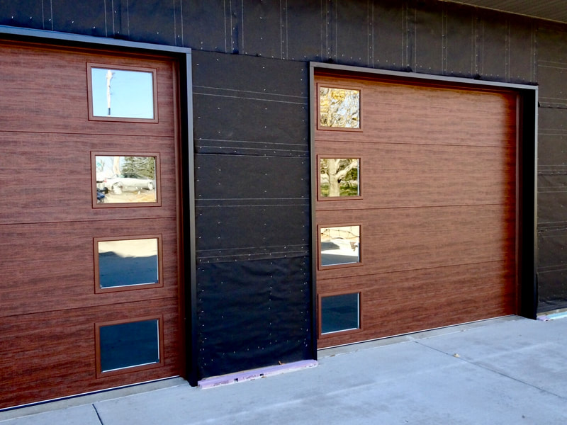 Clopay Modern Steel Collection Garage Doors.  Installed by Augusta Garage Door in St. Joseph, MN.