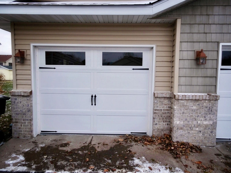 Wayne Dalton 9405 Garage Doors in White with Decorative Hardware.  Installed by Augusta Garage Door in Sartell, MN.