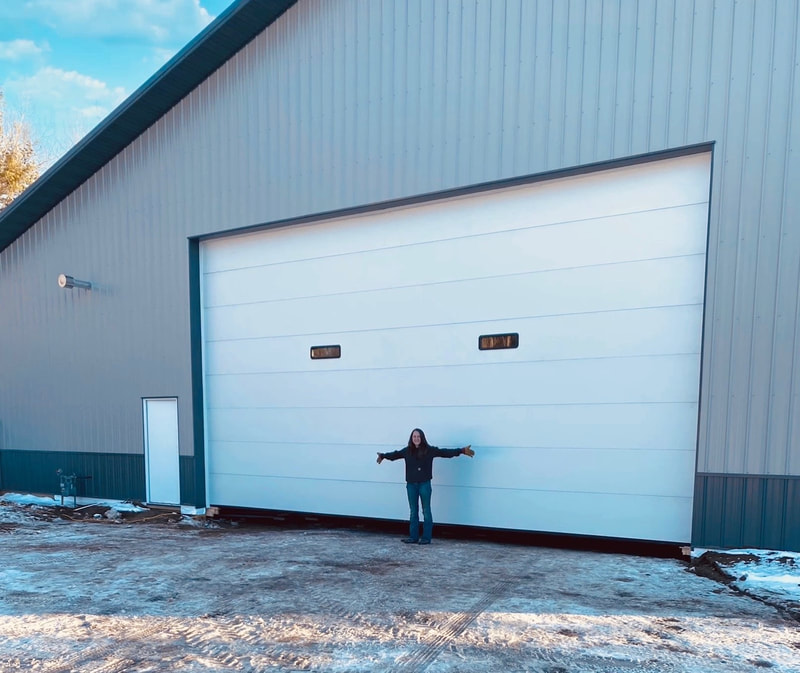 Wayne Dalton Thermospan 200, White, Flush Panel, Thermolite Windows.  Installed by Augusta Garage Door in Nisswa, MN.